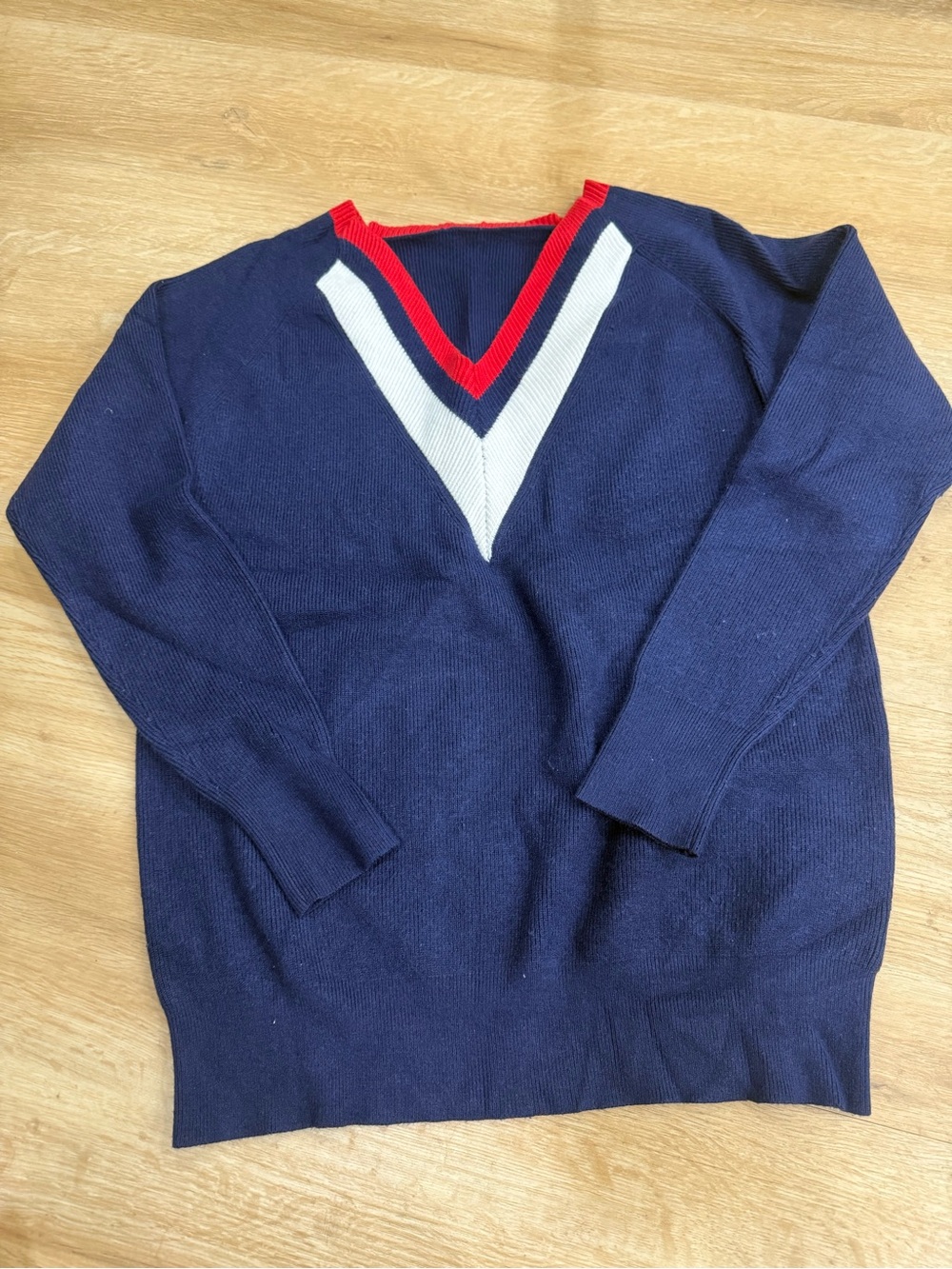 Girdear lady’s Navy V-Neck Sweater with Red & White Trim